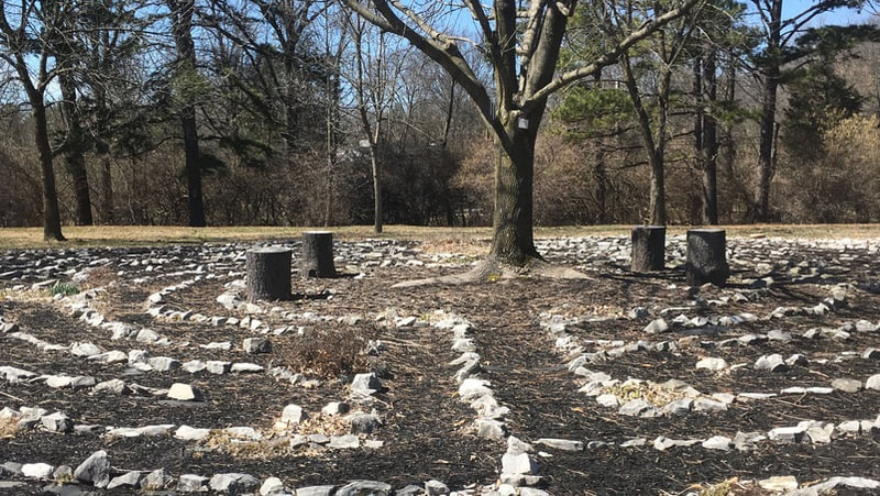Outdoor Chartres labyrinth in early March, bare trees